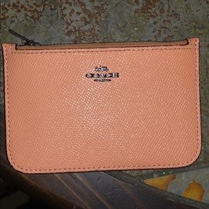 Pink leather coach wallet